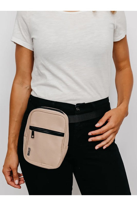 Beige Jet Crossbody Sling on model waist 