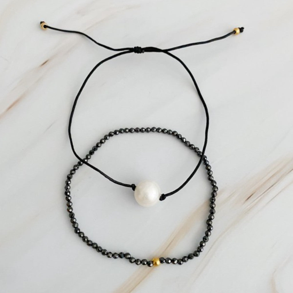 Black Genuine Pearl Dream Bracelet on marble background