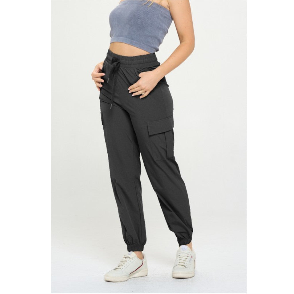 Black Women's Cargo Joggers Lightweight Quick Dry Pants on model side view