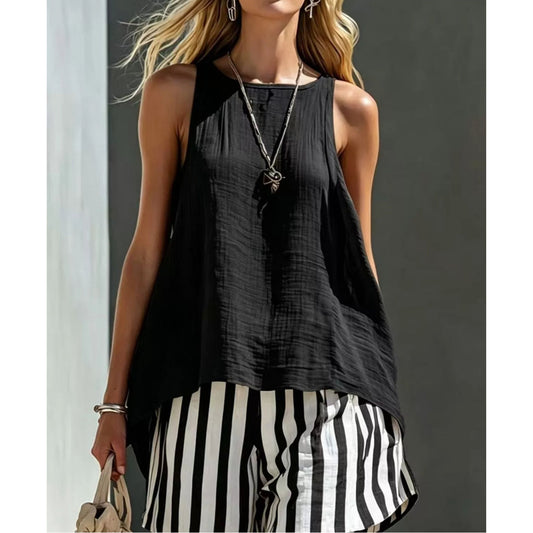 A woman wearing a Black Round Neck Tank and Striped Shorts Set.