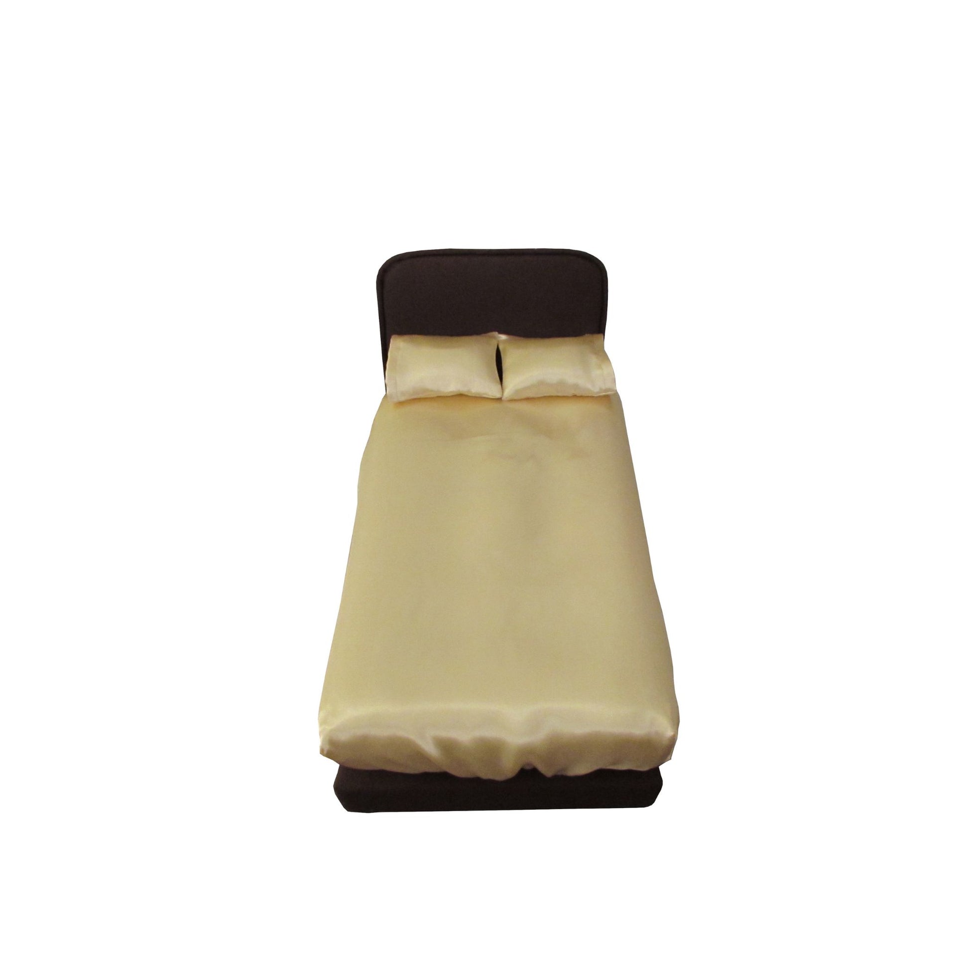 Brown upholstered doll bed with light yellow pillowcases and fitted sheet for 11.5-inch to 12-inch dolls - Up Close