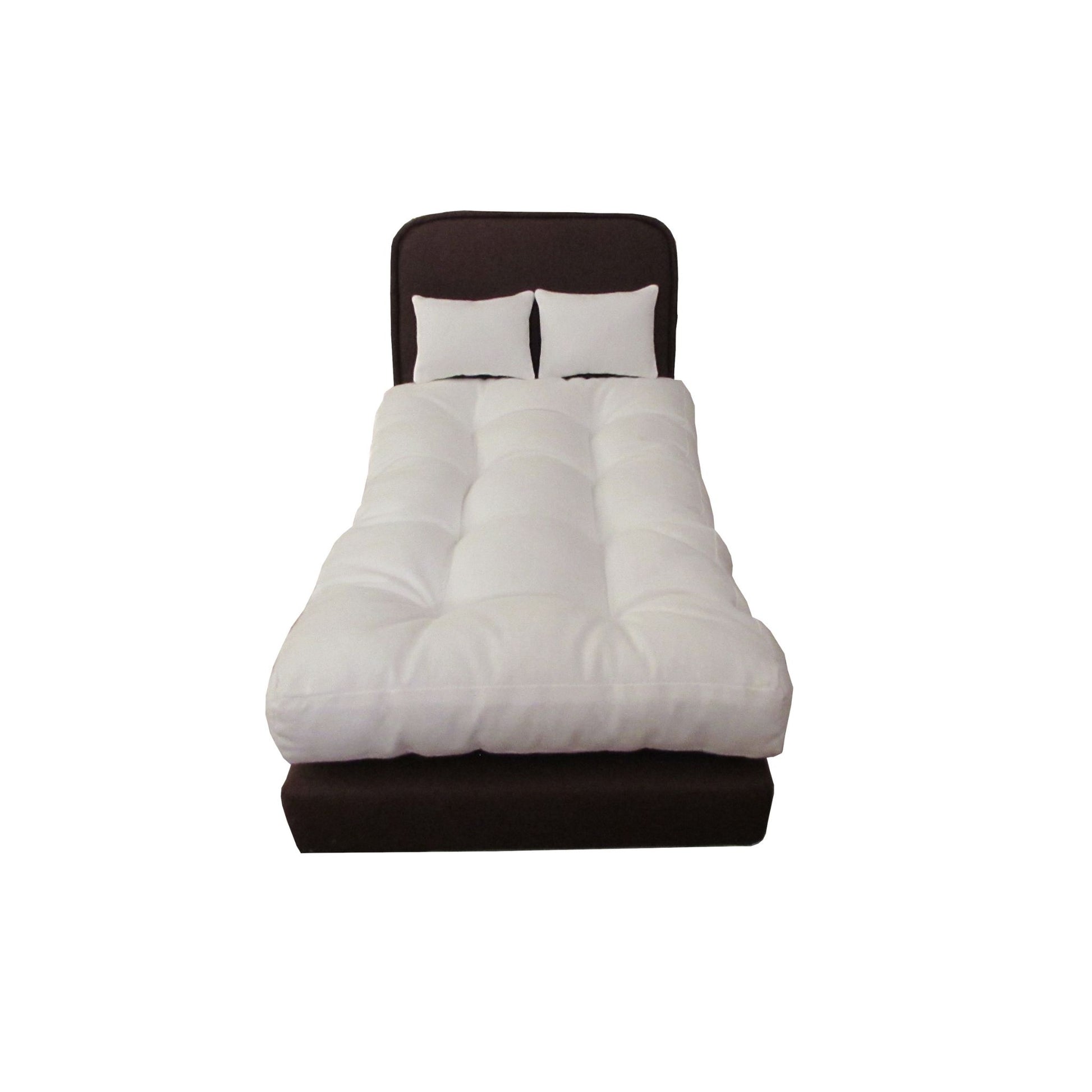 White mattress and pillows on a brown doll bed on a white background