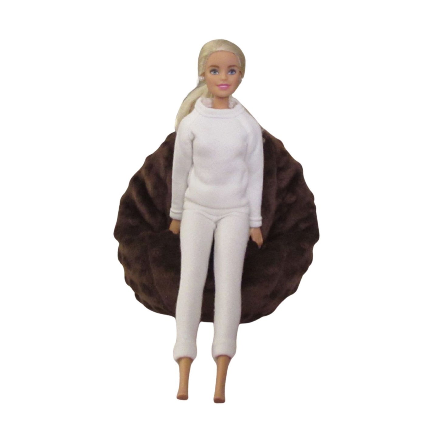 11-5-inch doll wearing a white sweatsuit sitting on a brown minky bean bag
