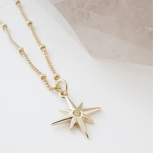 Gold North Star Necklace Corner view