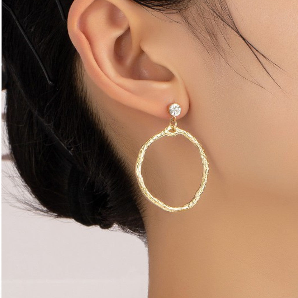 Hammered Hoop Drop Earrings on ear