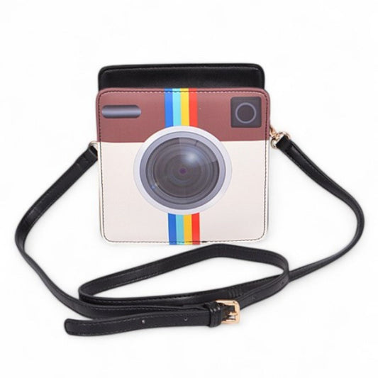 Camera-shaped pouch with a black strap on a white background