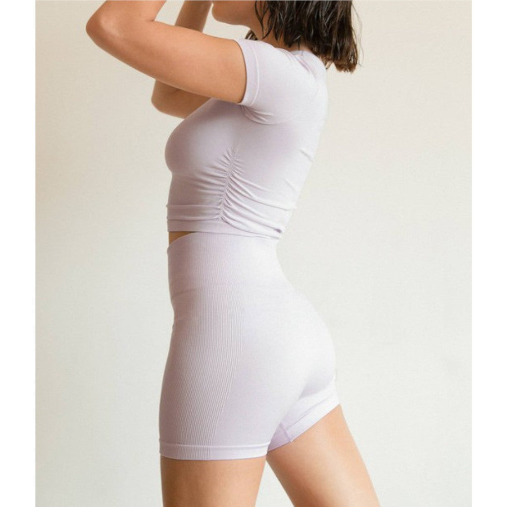 Pastel Purple Seamless Biker Shorts on model side view