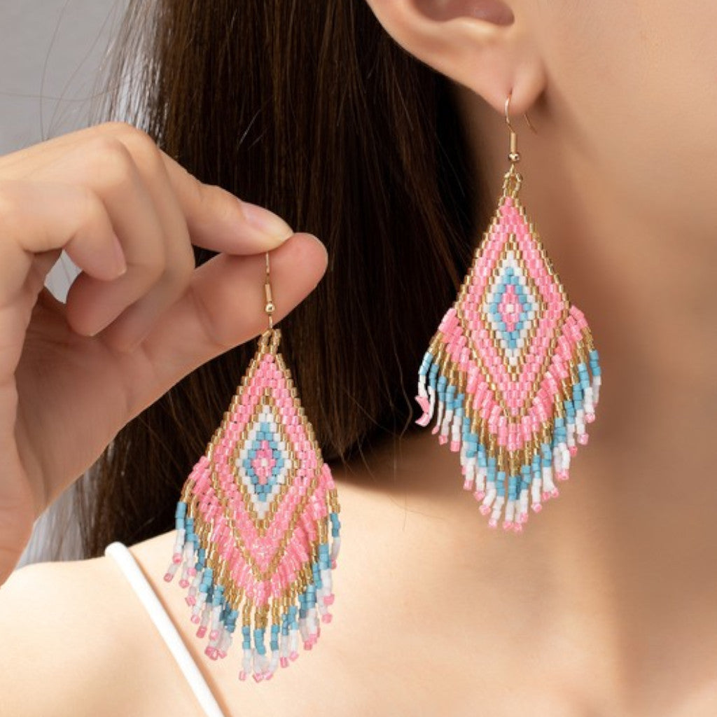 Pink Boho Seed Bead Drop Earrings on ear