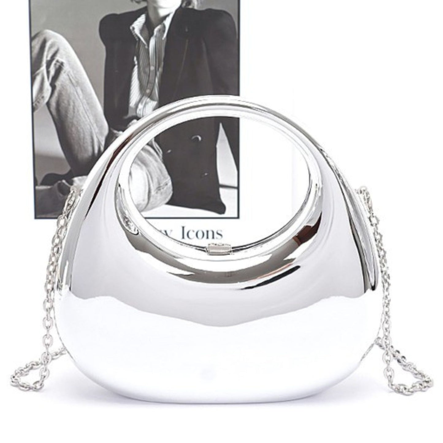Silver handbag with chain strap on a white background