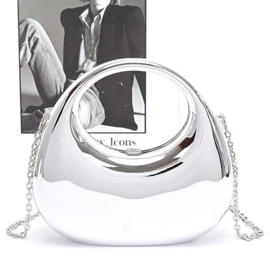 Silver handbag with chain strap on a white background