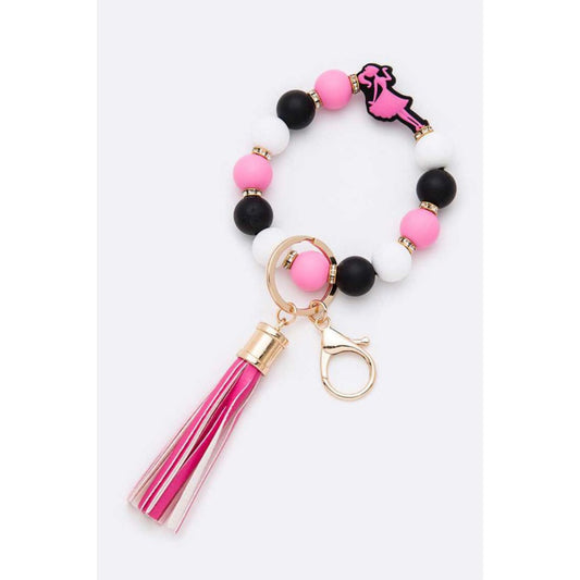 Beaded keychain with pink tassel on a white background