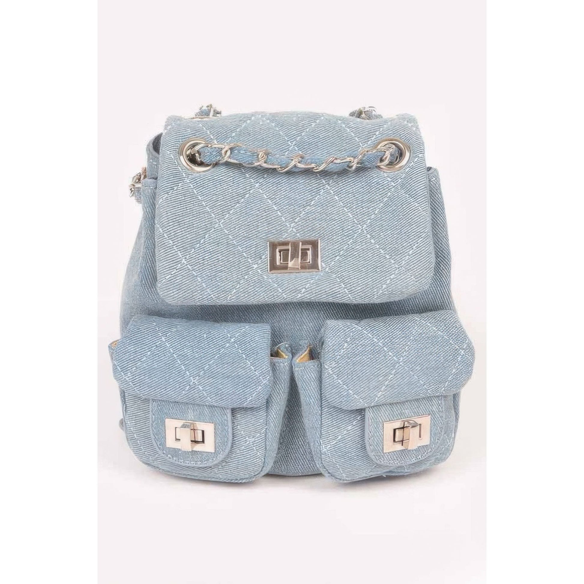 Light blue denim backpack with gold chain and locks on a white background