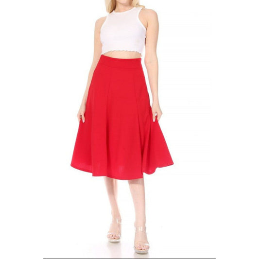 Person wearing a white top and red skirt on a white background
