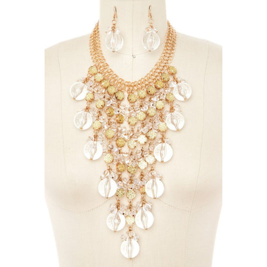 Necklace and earrings set on a mannequin with a beige background