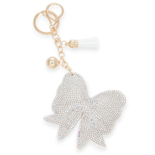 Pearl heart keychain with gold chain on a white background