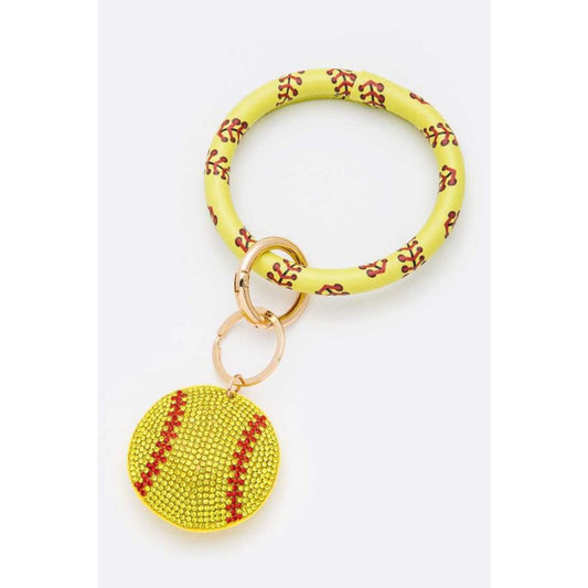 Yellow keychain with a softball charm on a white background