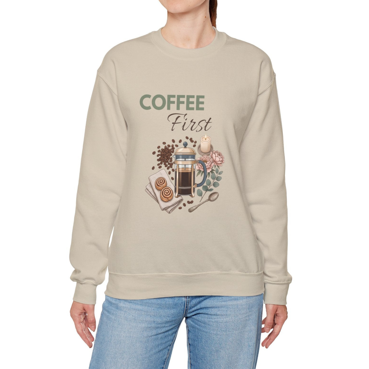 A woman is wearing a sand-colored crewneck sweatshirt.