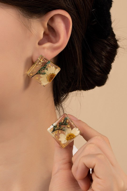 Square Resin Stud Earrings with Dried Daisy Flower on a Model