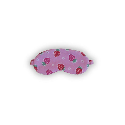 Pink sleep mask with strawberry pattern on a white background
