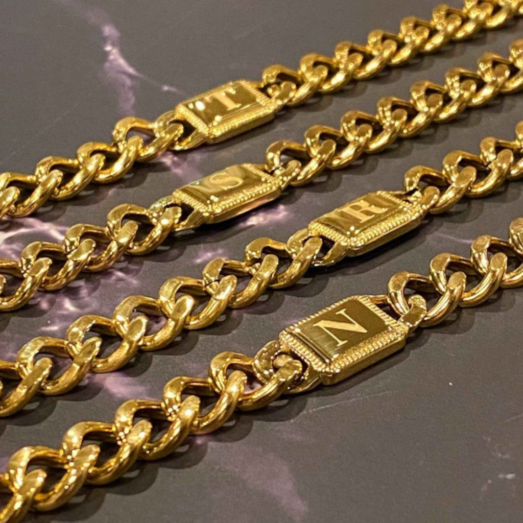 T, S, R, and N Initial Gold Cuban Chain bracelets
