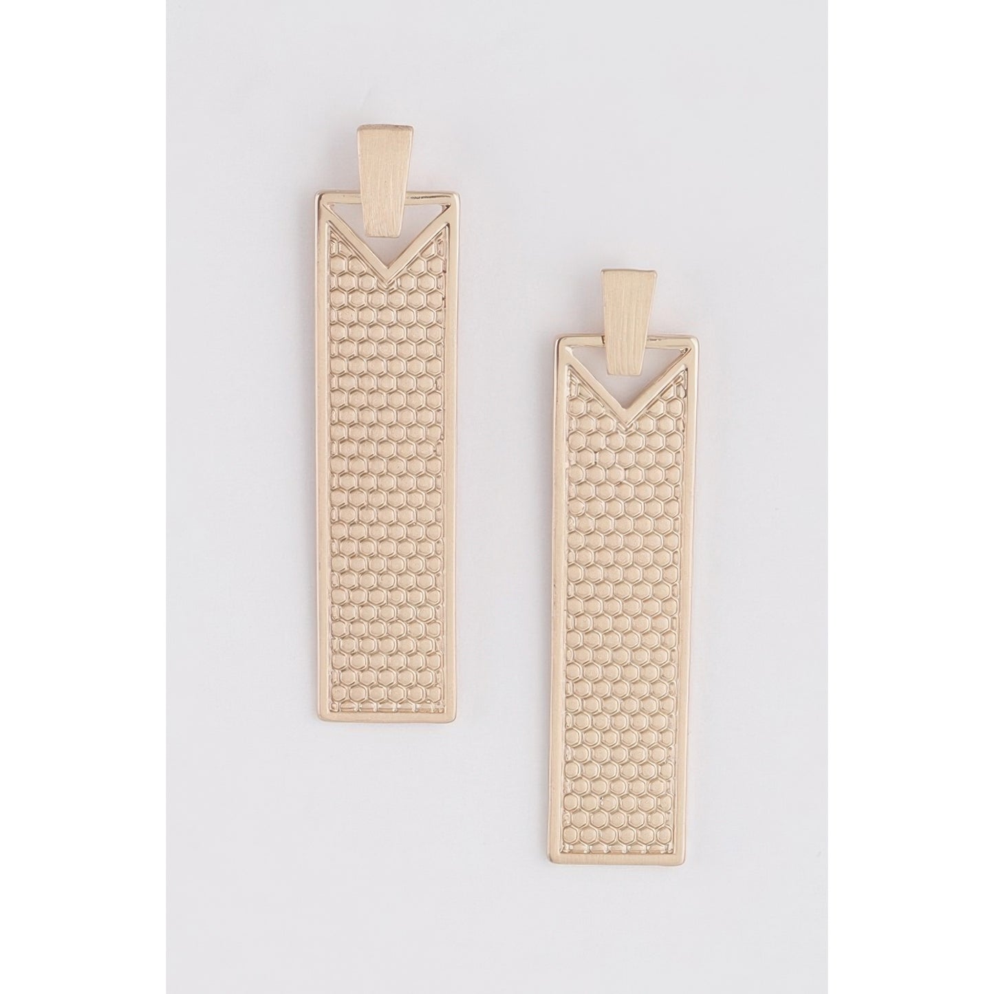 Two rectangular gold metal earrings with a textured honeycomb pattern and a V-shaped cutout at the top, displayed on a light gray background.