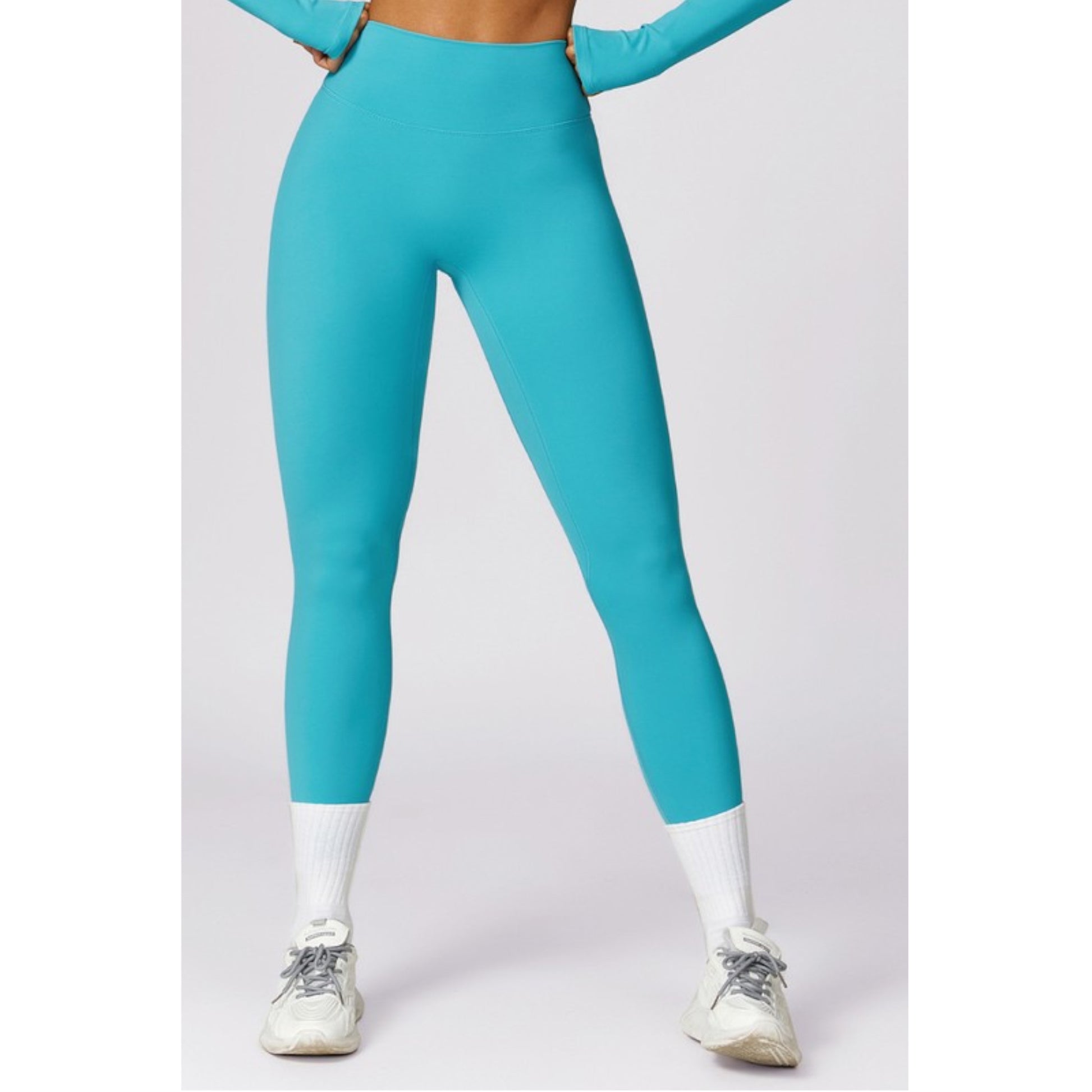 Turquoise Solid High-waisted Hip-lifting Athletic Leggings Front view