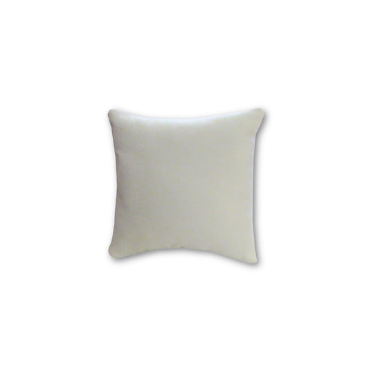 White doll pillow on a white background