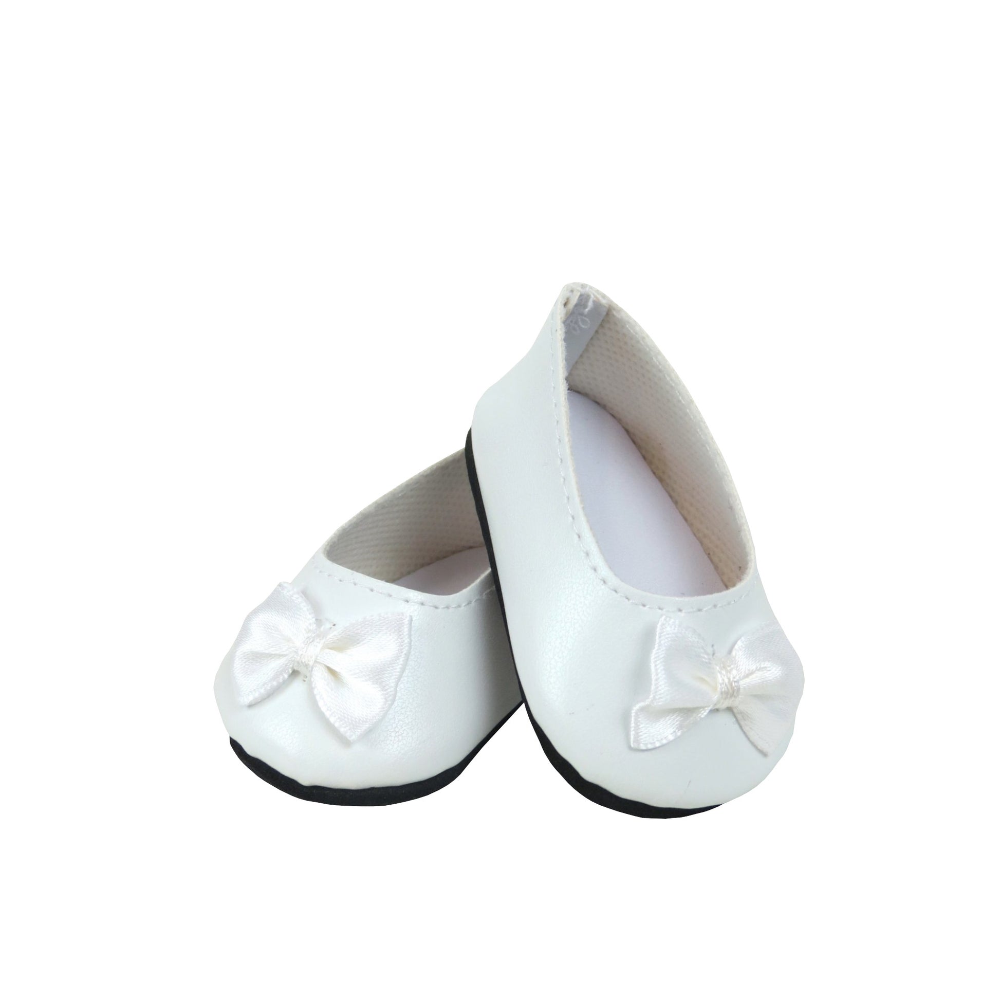 White doll shoes with bows on a white background