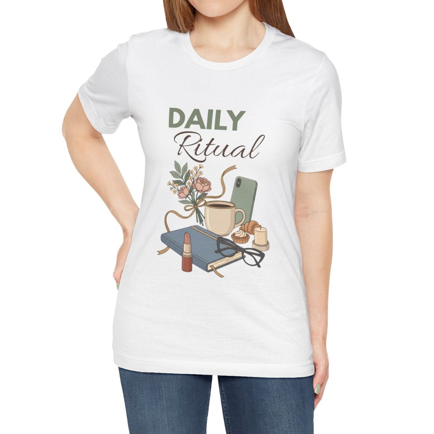 White t-shirt with 'Daily Ritual' graphic design featuring a cup, book, and glasses on a white background.