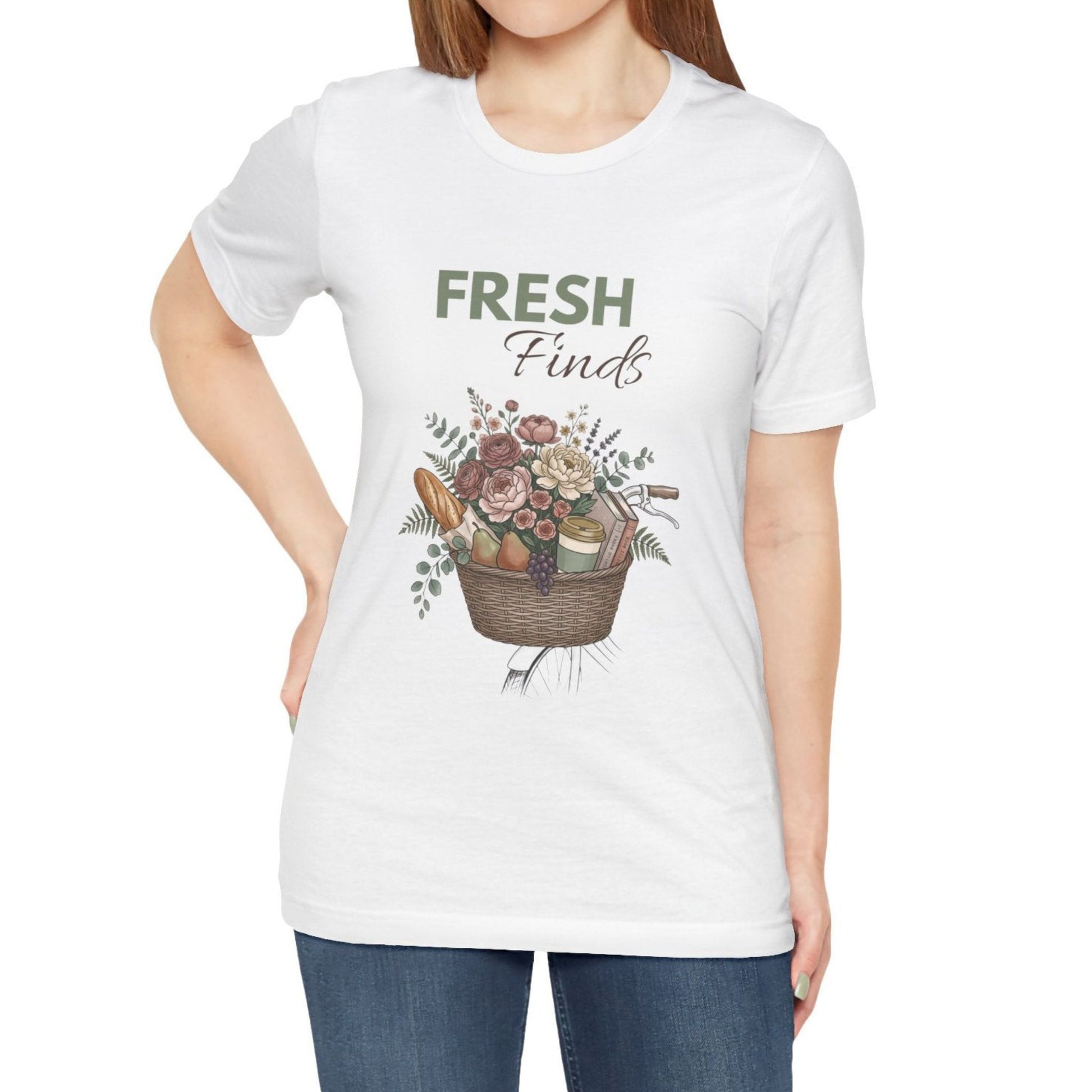 A woman wearing a white t-shirt with 'FRESH Finds' on the front.