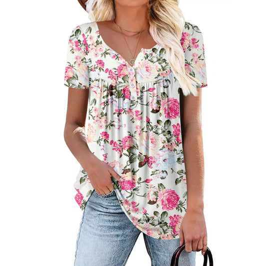 Woman wearing a floral blouse with pink flowers on a white background