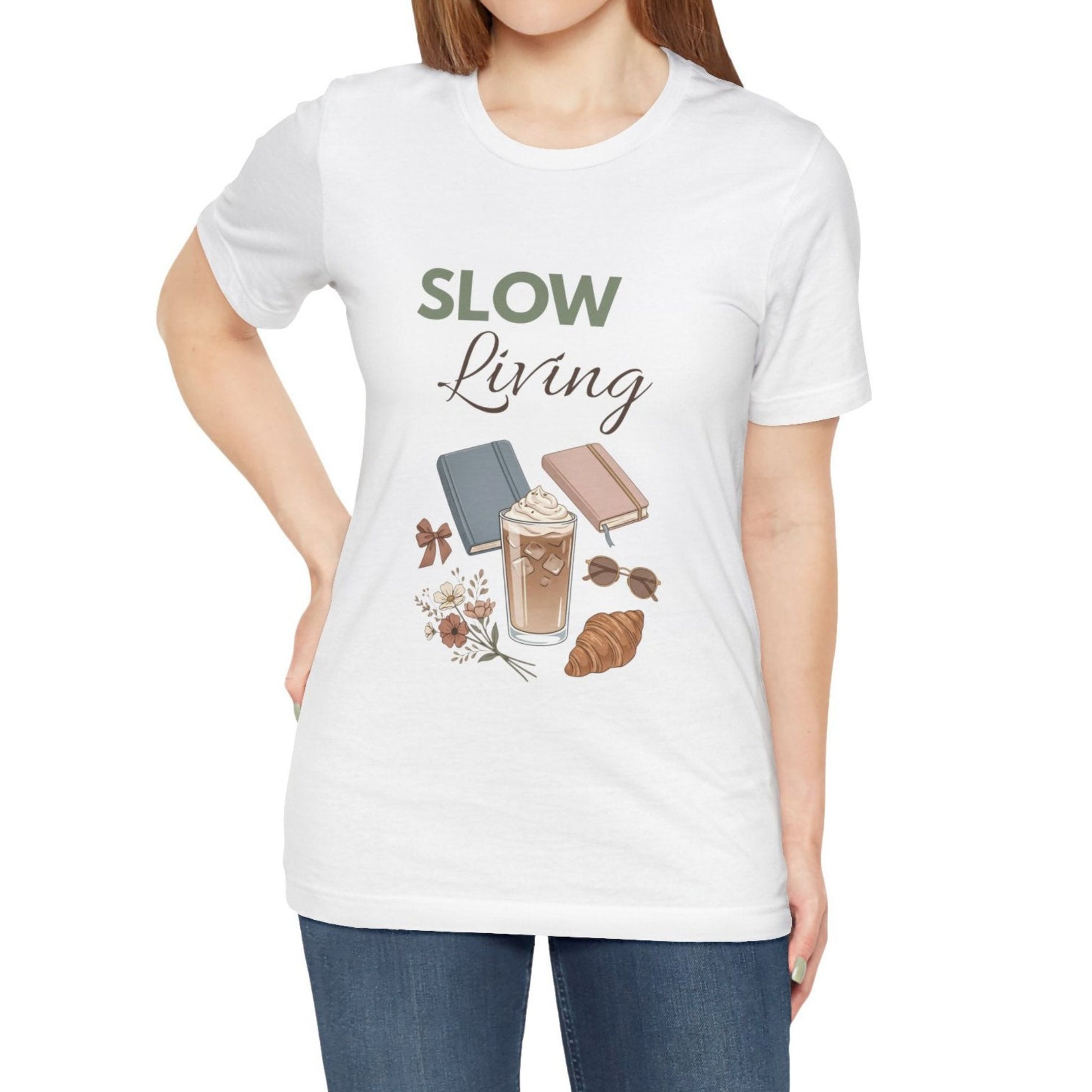 White t-shirt with 'SLOW Living' text and graphics worn by a person on a white background