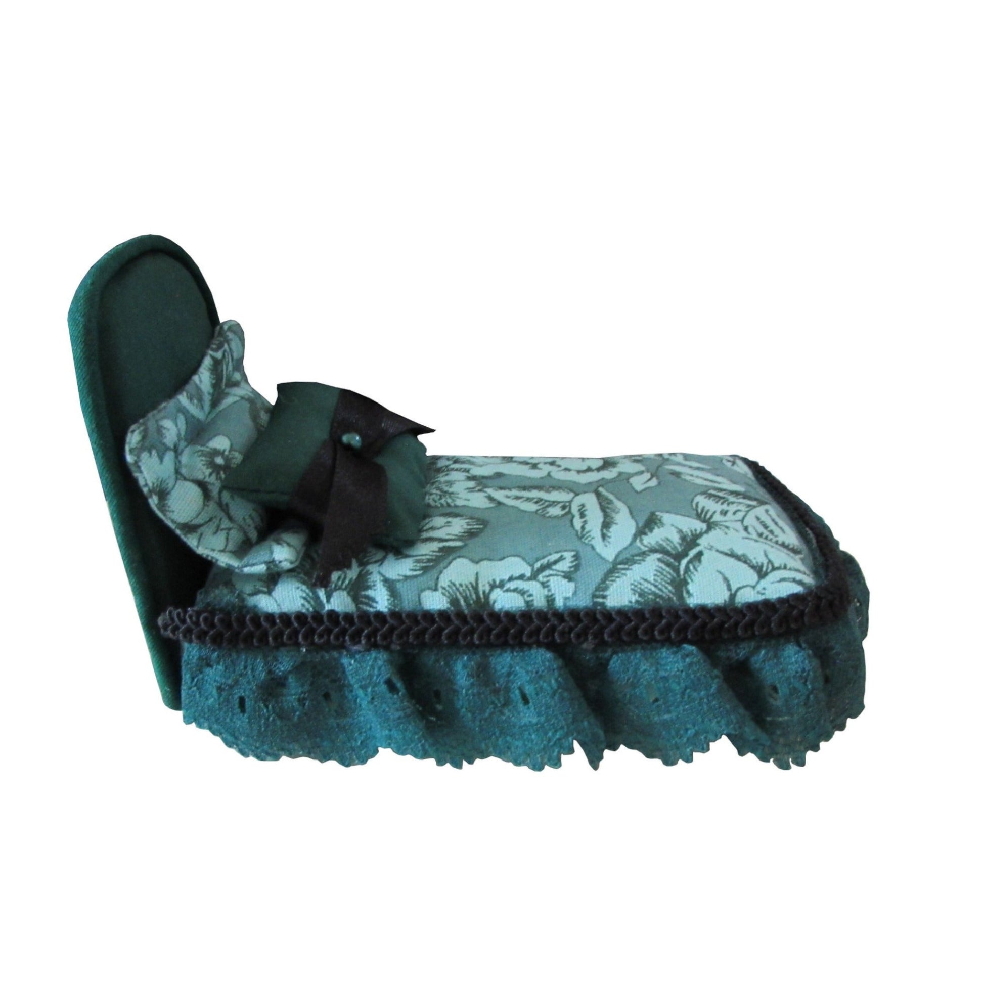 Green Pincushion Bed with Lace-Trimmed Floral Bedding Side view