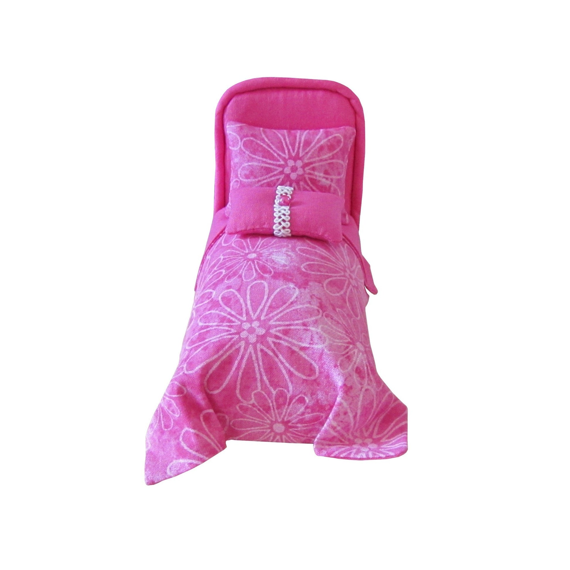 Pink Pincushion Bed with Floral Bedding Front view