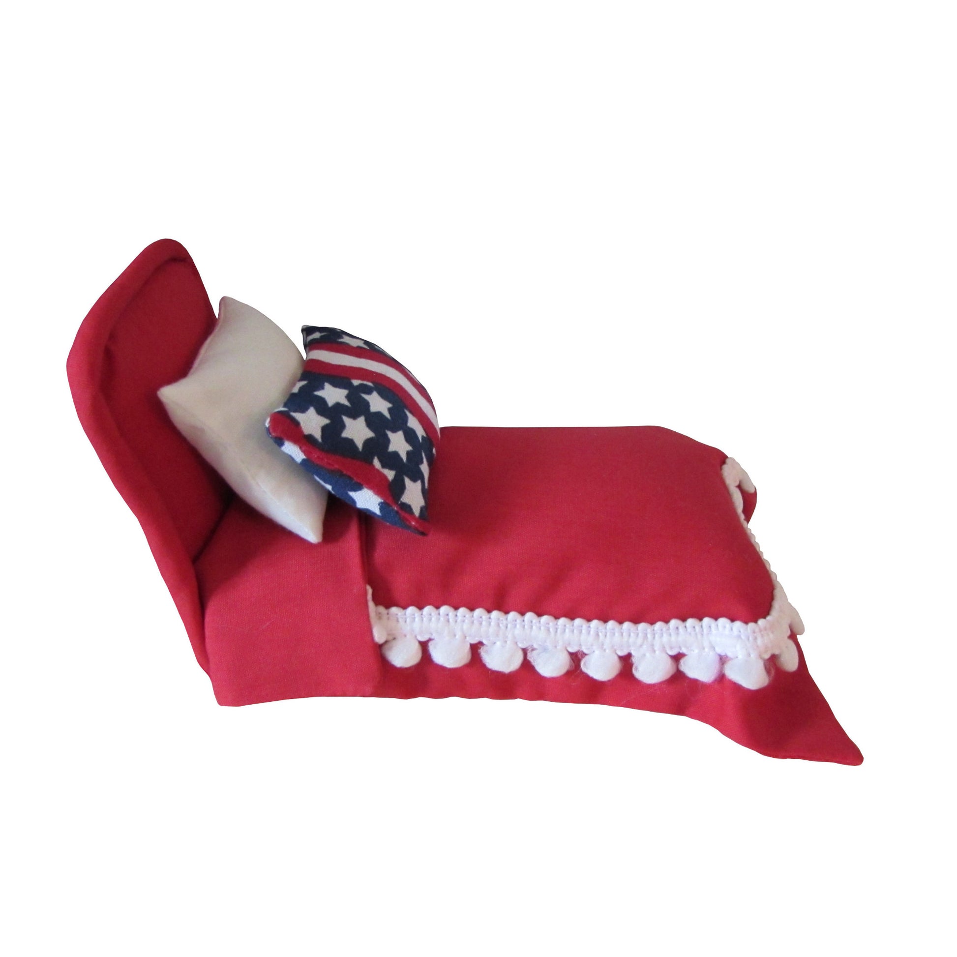 Red Pincushion Bed with Stars and Stripes Pillow Side view