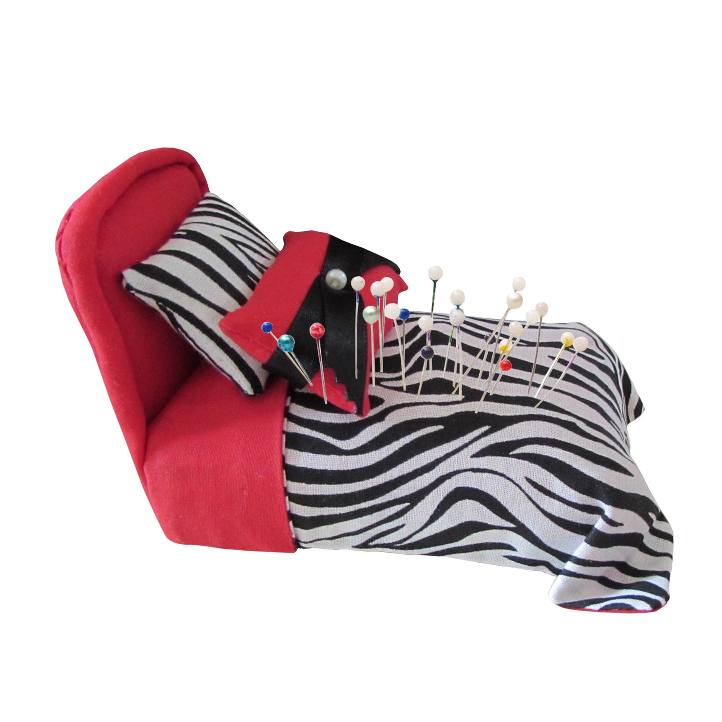 Red Pincushion Bed with Zebra Bedding Side view with pins