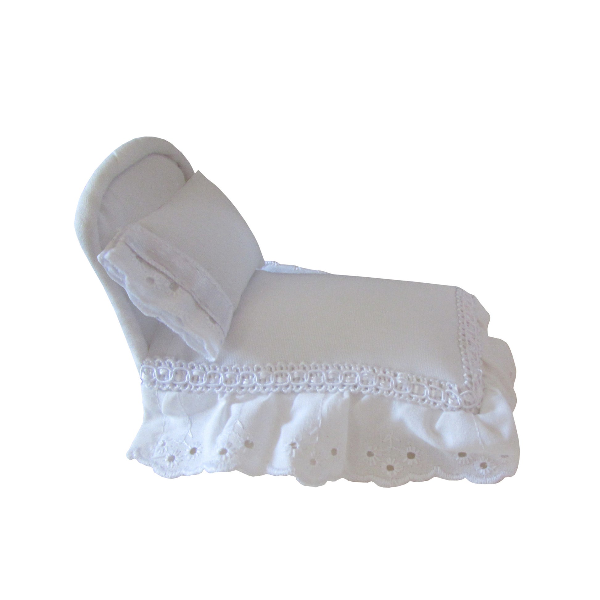 White Pincushion Bed with Lace-Trimmed Bedding Side view